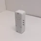 Wi-Fi Jammer Detector kit from corner angle showing detector unit, USB wall adapter, Ethernet cable, and Micro-USB cable laid out on white table